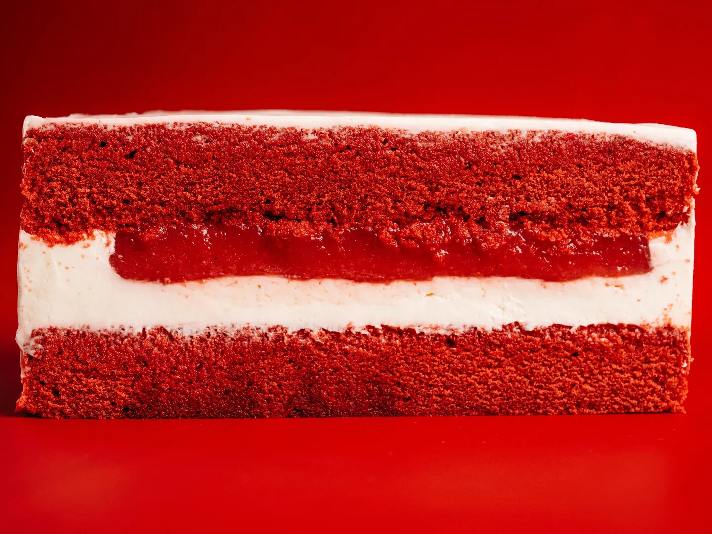 Bizcocho chiffon Red Velvet · frosting de queso crema
Clásico · frambuesa · fresa